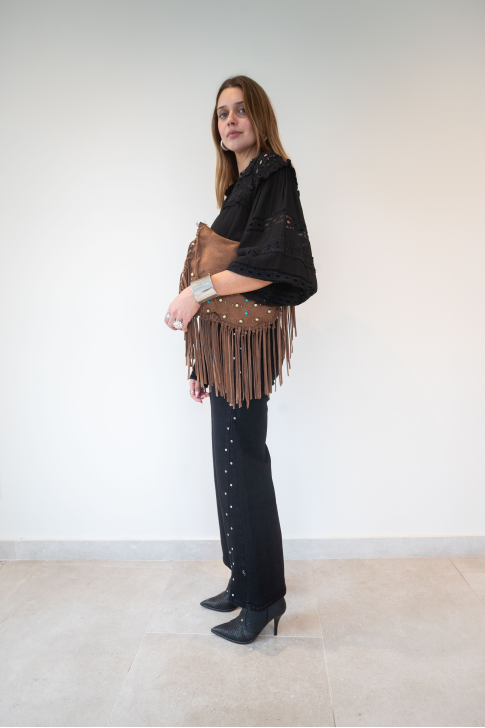 Pantalón denim tachuelas