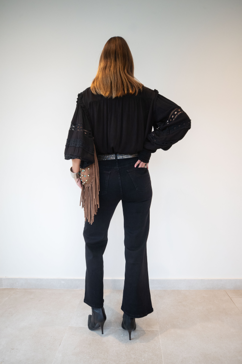 Pantalón denim tachuelas