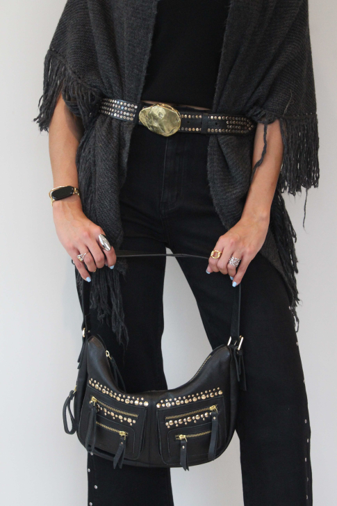 Pantalón denim tachuelas